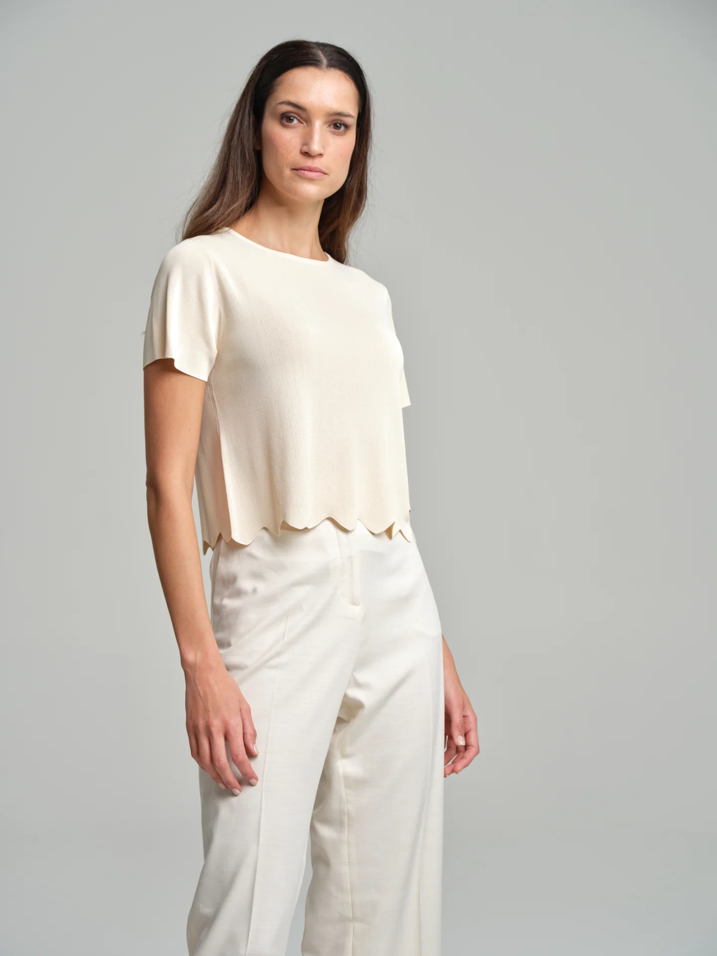 Sweater with scalloped hem
